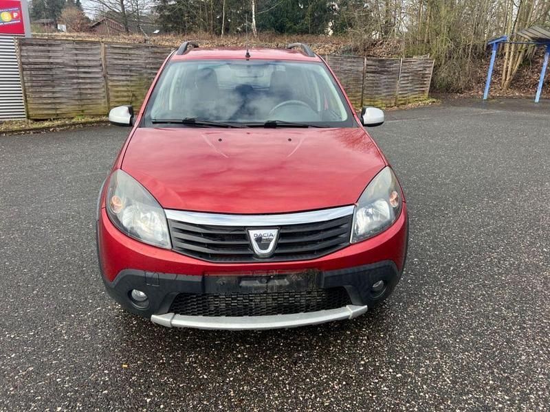 Second-hand Dacia Sandero Stepway 88 CP (64 kW) 2011 Roșu Berlinǎ