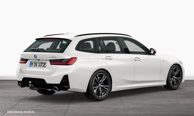 Gebraucht BMW 330e Performance 292 PS (214 kW) 2025 Mineralweiß Kombi