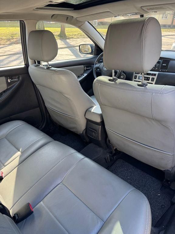 Gebraucht Toyota Corolla 110 PS (80 kW) 2003 Blau Limousine