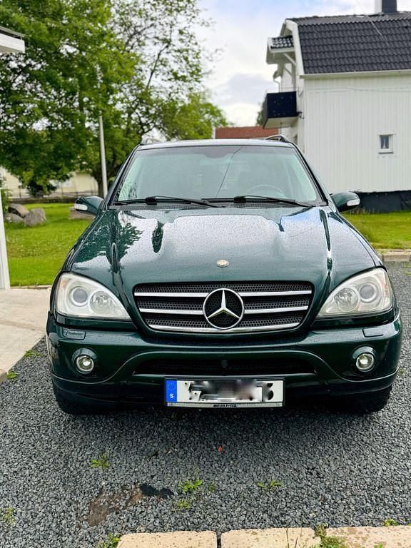 Grün Gebraucht 2002 Mercedes ML55 AMG AMG SUV | 7.200 € (Fairer Preis) - Bild 1/4