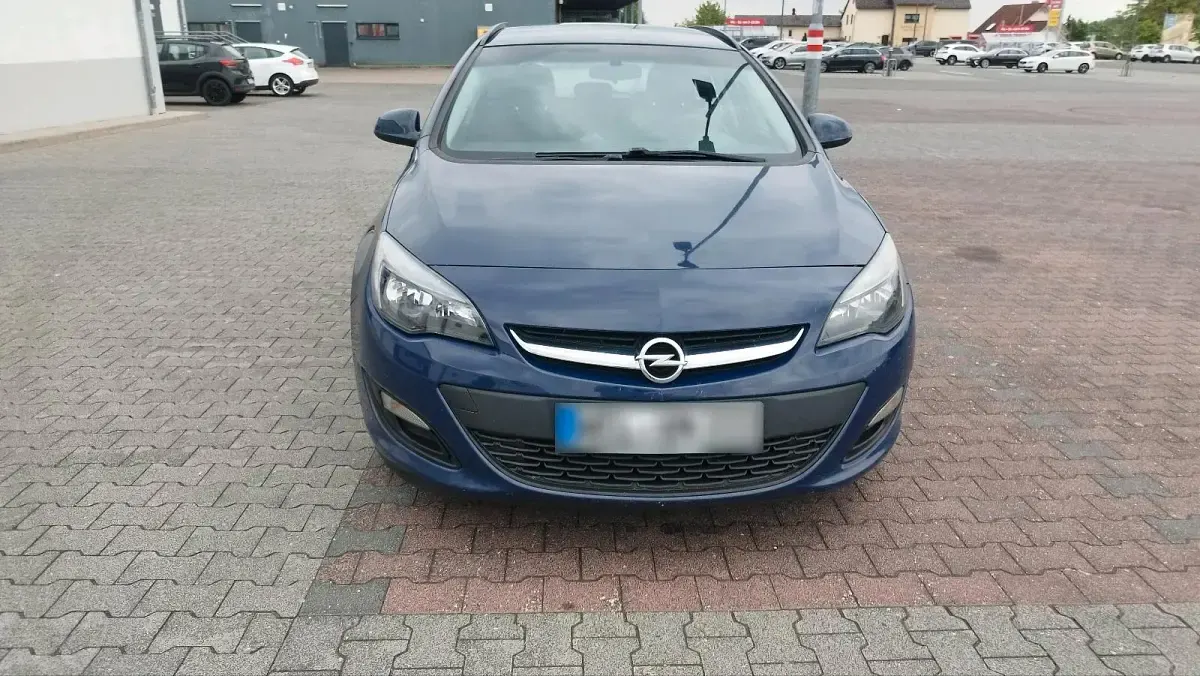 Używany Opel Astra 110 KM (80 kW) 2013 Niebieski Kombi
