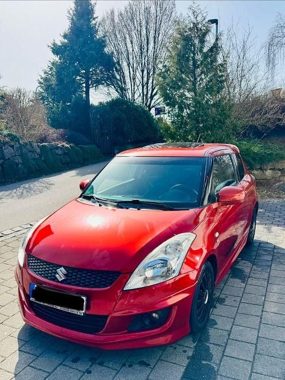 Gebraucht Suzuki Swift Comfort 94 PS (69 kW) 2011 Orange Kleinwagen