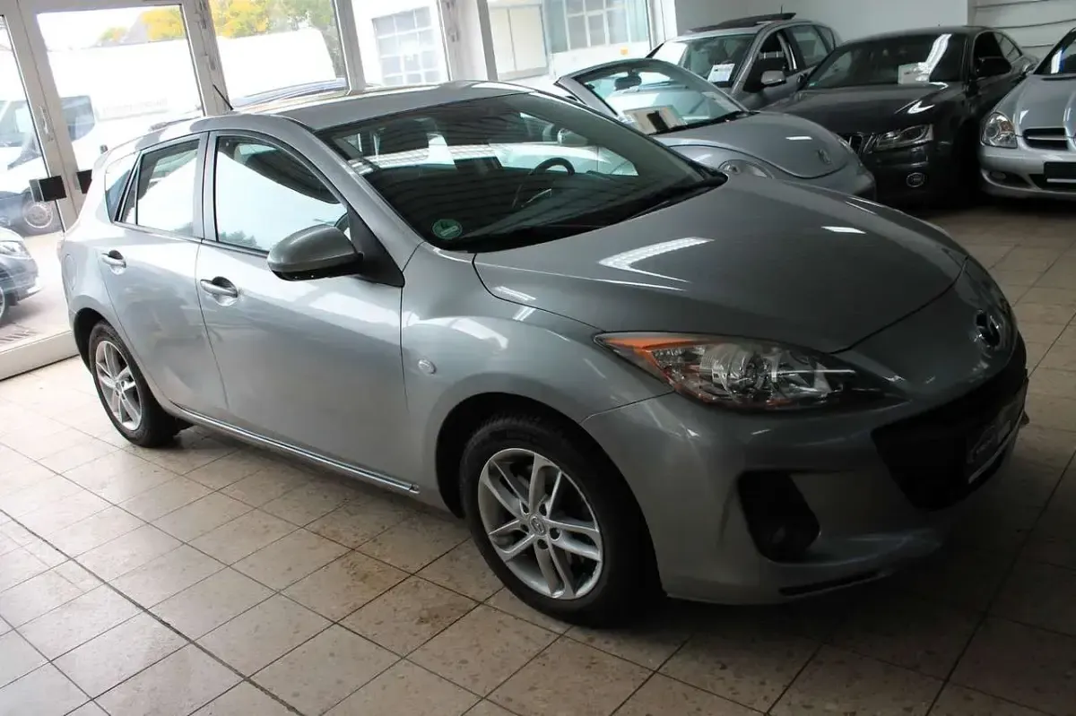 Używany Mazda 3 Edition 150 KM (110 kW) 2012 Srebrny Sedan/Limuzyna