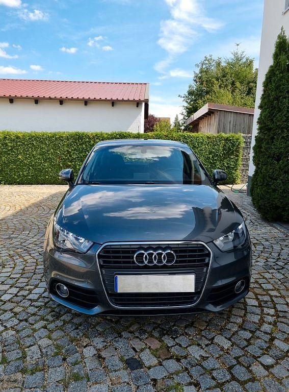 Grau Gebraucht 2012 Audi A1 Sportback Kleinwagen | 9.499 € (Fairer Preis) - Bild 1/4