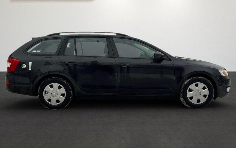 Second-hand Skoda Octavia Active 105 CP (77 kW) 2013 Negru Break