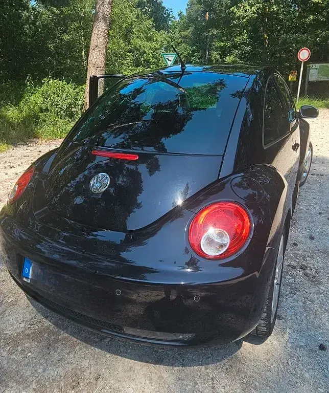 Gebraucht VW New Beetle 102 PS (75 kW) 2010 Schwarz Kleinwagen