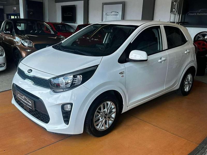 Weiß Gebraucht 2021 Kia Picanto DREAM-TEAM Edition Kleinwagen | 11.690 € (Fairer Preis) - Bild 1/3
