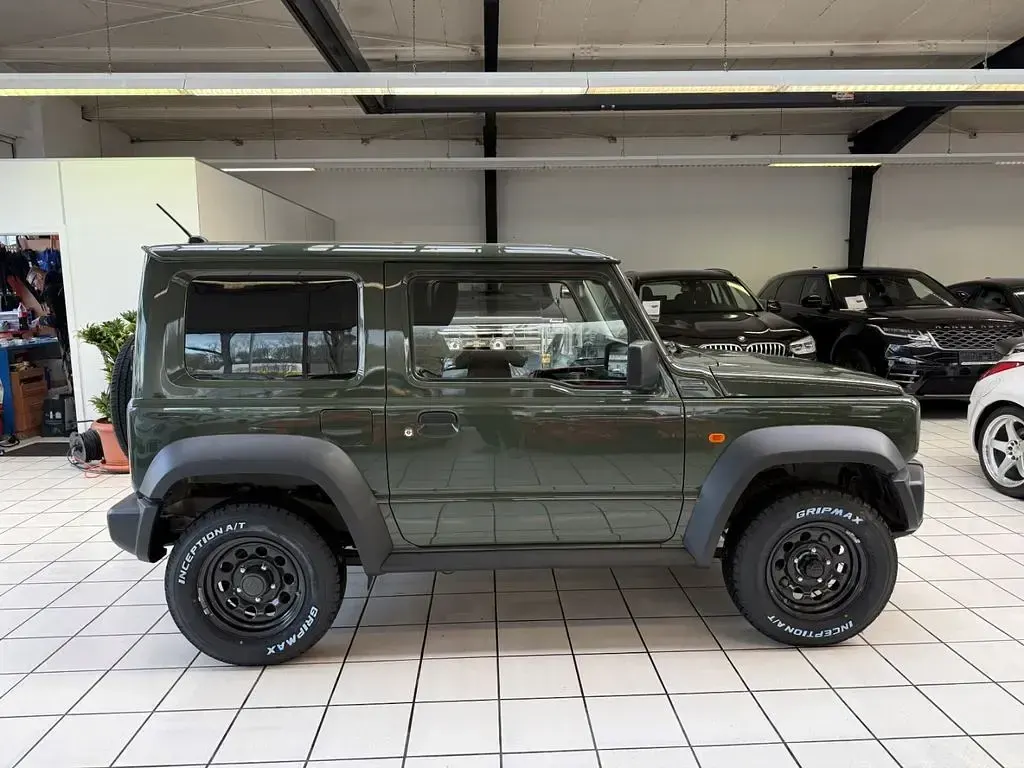 Gebraucht Suzuki Jimny Comfort 103 PS (75 kW) 2019 Solid jungle green SUV