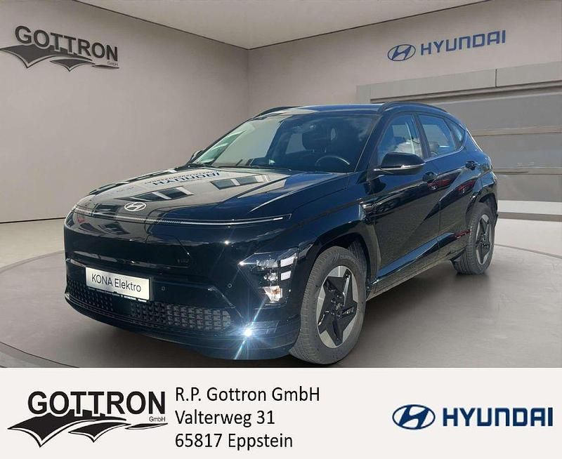 Abyss black Gebraucht 2024 Hyundai Kona Basis SUV | 25.900 € (Superpreis) - Bild 1/4