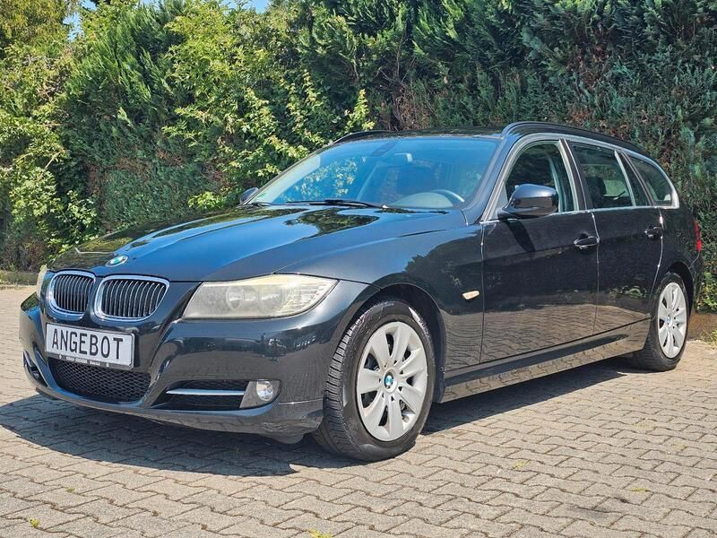Schwarz Gebraucht 2012 BMW 316 Exclusive Kombi | 4.790 € - Bild 1/4
