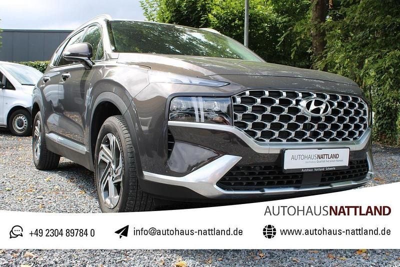 Taiga brown / mic Gebraucht 2023 Hyundai Santa Fe Trend SUV | 35.950 € (Superpreis) - Bild 1/4