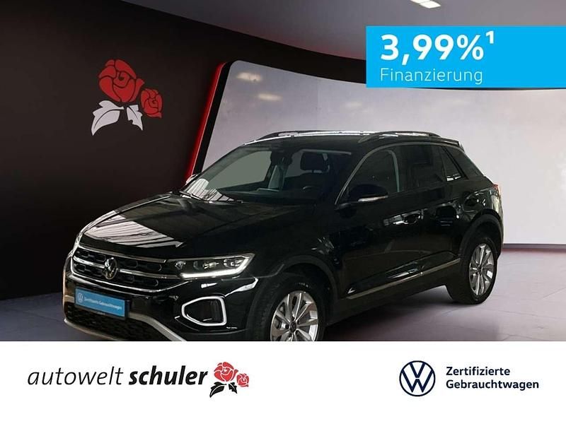 Deep black perleffekt (metallic) Gebraucht 2024 VW T-Roc Style SUV | 30.480 € (Fairer Preis) - Bild 1/4