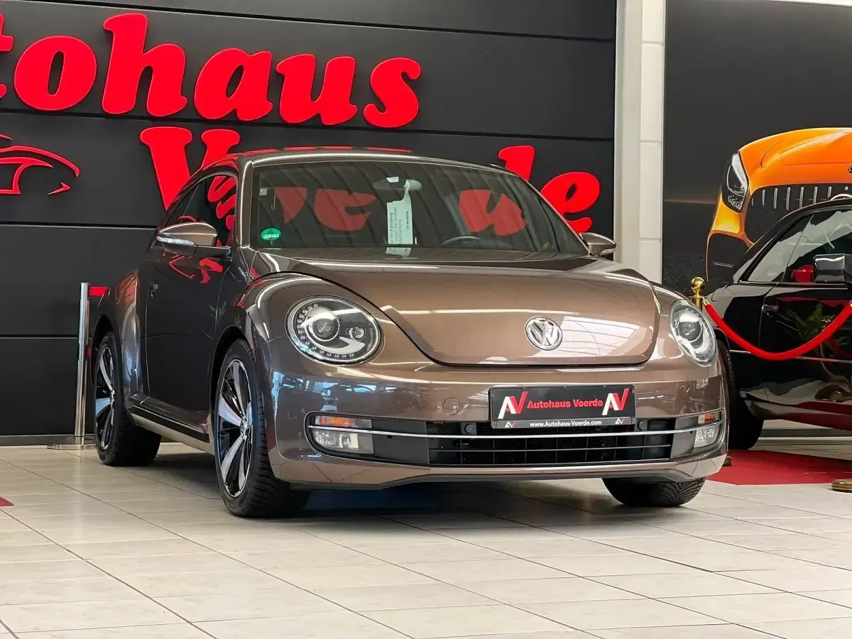 Gebraucht VW Beetle Design 105 PS (77 kW) 2013 Braun Kleinwagen