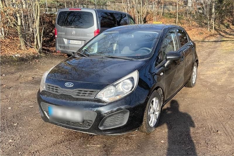 Gebraucht Kia Rio 109 PS (80 kW) 2011 Schwarz Kleinwagen