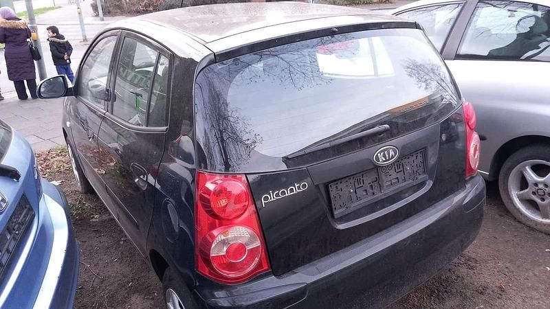 Gebraucht Kia Picanto 65 PS (47 kW) 2011 Schwarz Kleinwagen