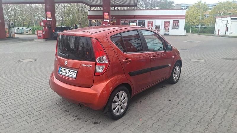 Second-hand Suzuki Splash 86 CP (63 kW) 2009 Portocaliu Hatchback