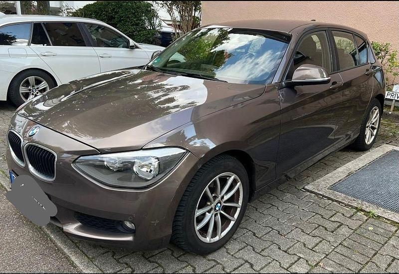 Braun Gebraucht 2014 BMW 116 Kleinwagen | 7.999 € (Guter Preis) - Bild 1/4