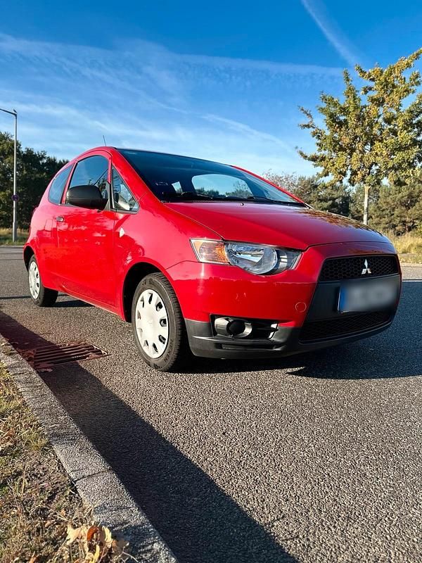 Rot Gebraucht 2009 Mitsubishi Colt Basis Kleinwagen | 3.500 € (Fairer Preis) - Bild 1/4