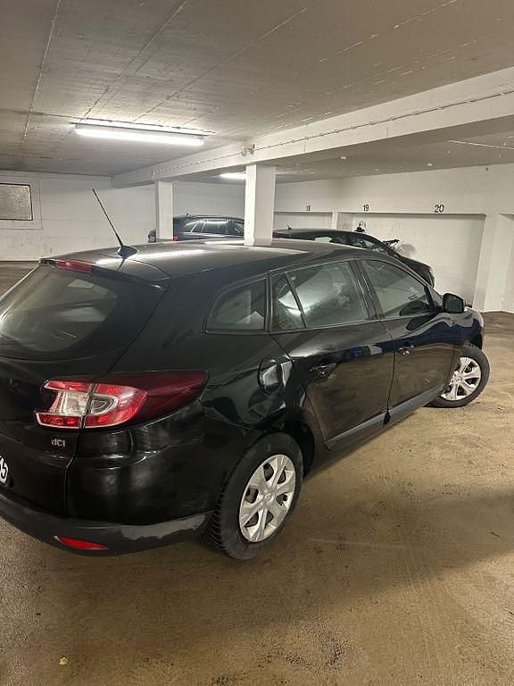 Używany Renault Mégane III Expression 90 KM (66 kW) 2012 Czarny Sedan/Limuzyna