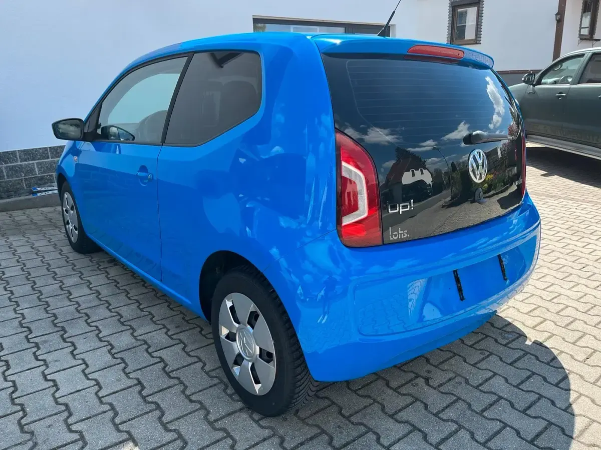 Używany VW up! 60 KM (44 kW) 2014 Niebieski Hatchback