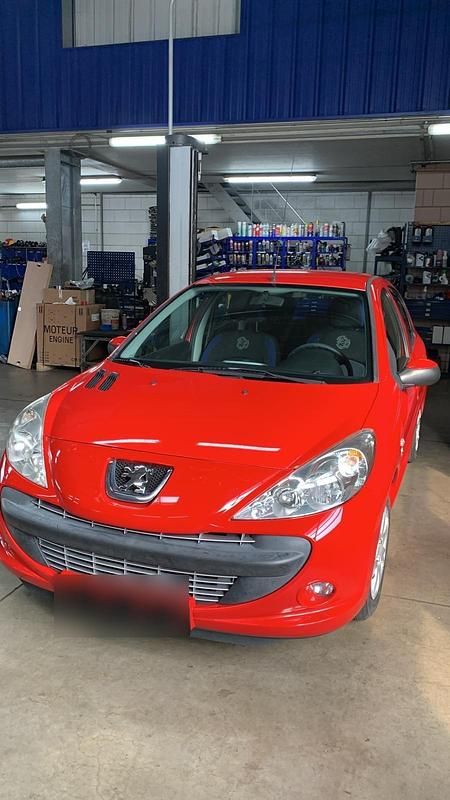 Gebraucht Peugeot 206+ 73 PS (53 kW) 2012 Rot Kleinwagen