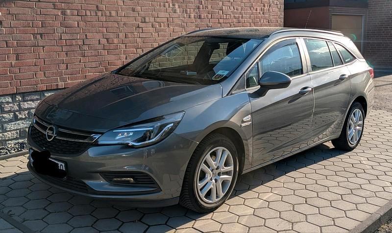 Grau Gebraucht 2018 Opel Astra Kombi | 7.999 € (Superpreis) - Bild 1/4