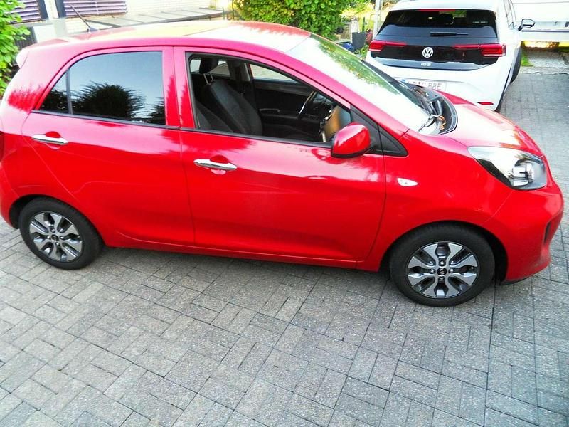 Gebraucht Kia Picanto 84 PS (61 kW) 2016 Signal red Kleinwagen