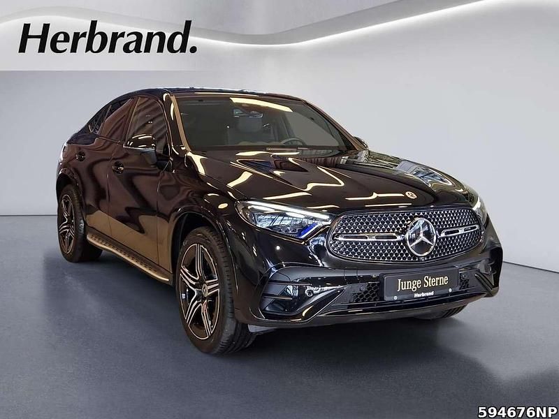 Gebraucht Mercedes GLC300e AMG 333 PS (244 kW) 2024 Metalliclack obsidianschwarz Coupé