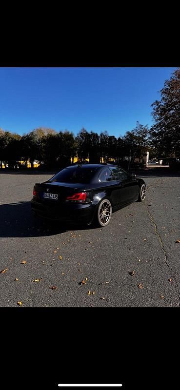 Schwarz Gebraucht 2011 BMW 135 Coupé M Performance Coupé | 14.000 € - Bild 1/4
