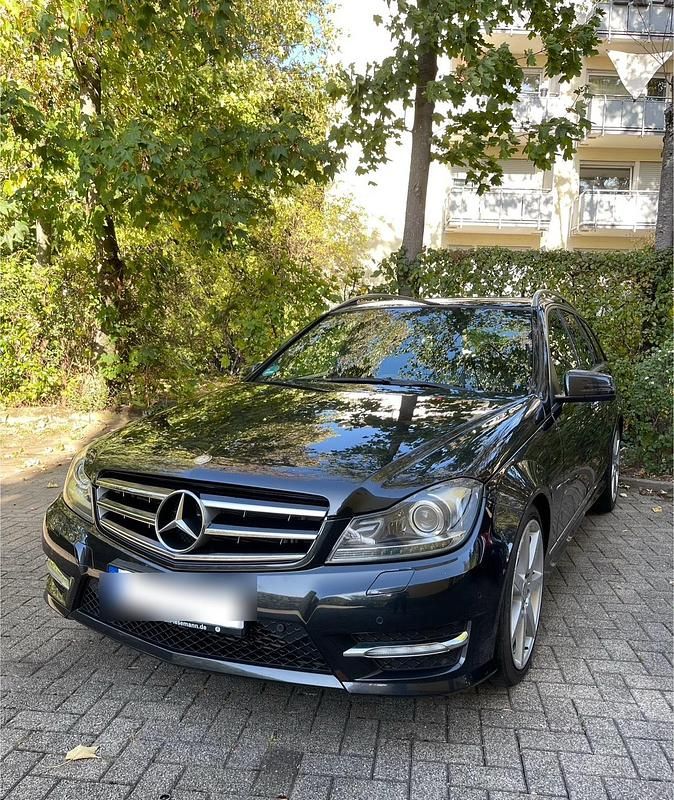 Schwarz Gebraucht 2011 Mercedes C250 AMG Kombi | 9.000 € (Fairer Preis) - Bild 1/4
