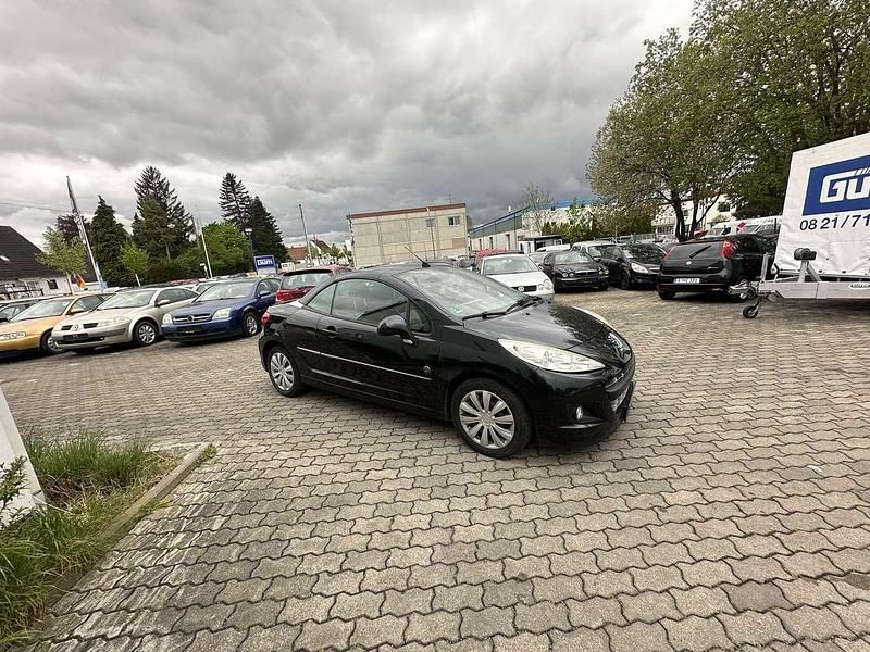 Farbe schwarzobsidien/metallic Gebraucht 2010 Peugeot 207 Roland Garros Cabrio | 2.900 € (Fairer Preis) - Bild 1/4