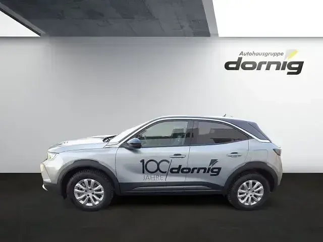 Gebraucht Opel Mokka-e Ultimate 100 kW (136 PS) 2022 Quarz silber (metallic) SUV