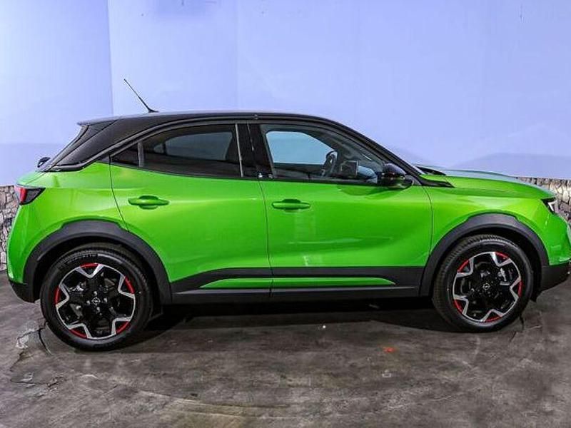 Gebraucht Opel Mokka-e 100 kW (136 PS) 2023 Ikone grün metallic SUV