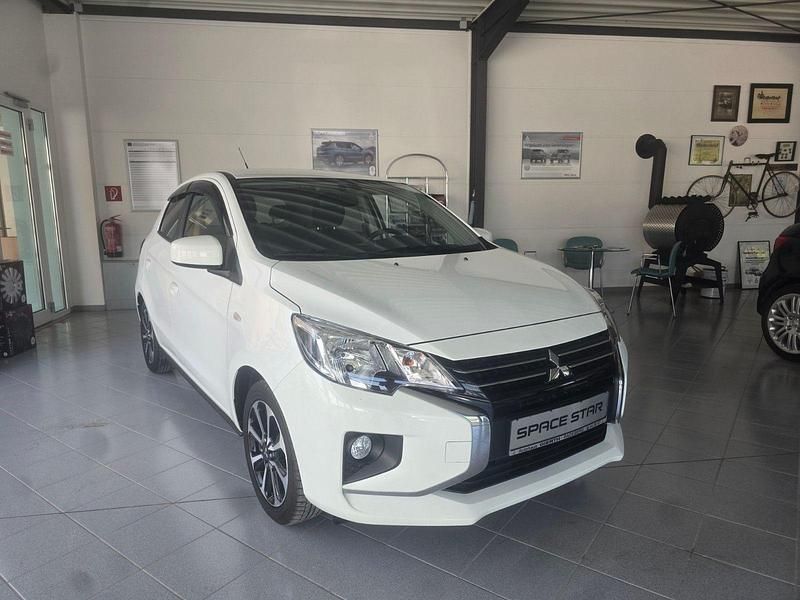 Weiß Gebraucht 2021 Mitsubishi Space Star Spirit+ Kleinwagen | 14.290 € (Fairer Preis) - Bild 1/4