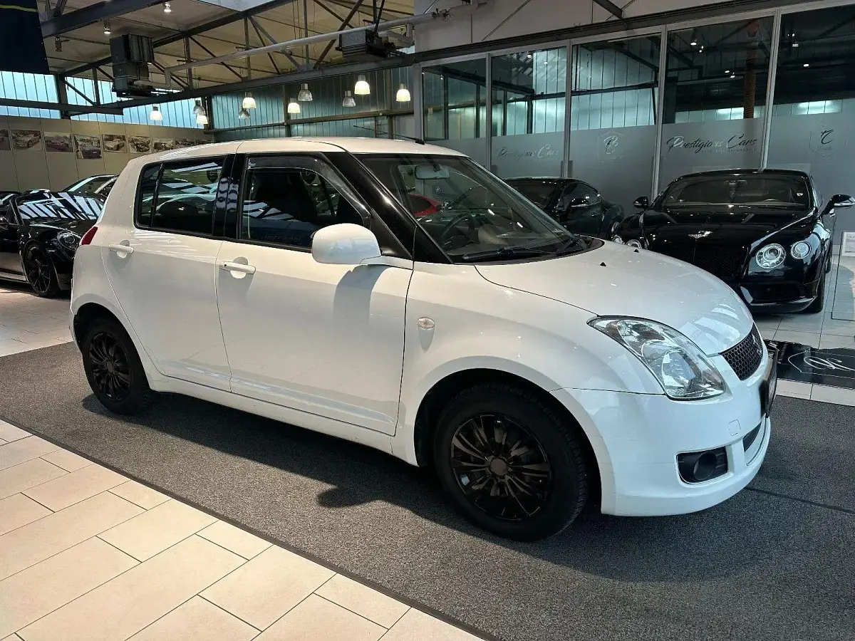 Usata Suzuki Swift 92 CV (67 kW) 2009 Bianco Utilitaria