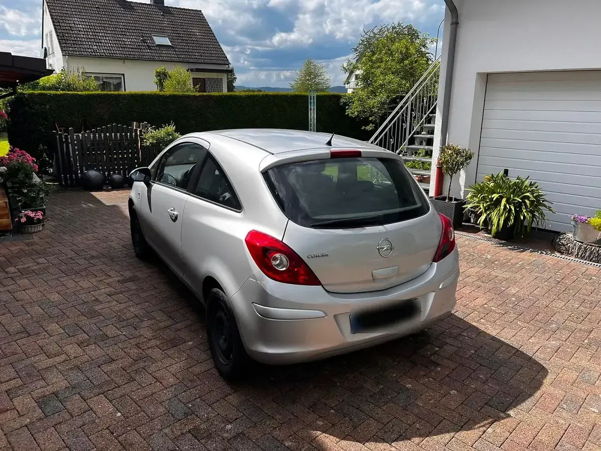 Gebraucht Opel Corsa 69 PS (50 kW) 2014 Silber Kleinwagen