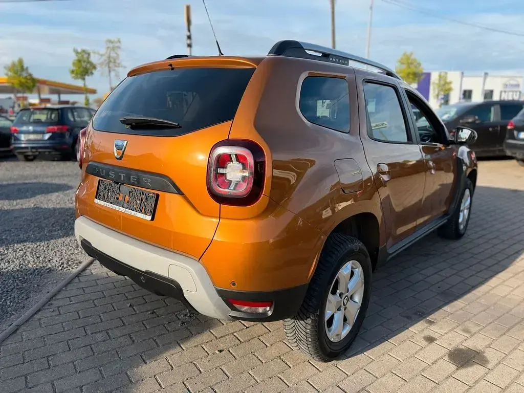 Używany Dacia Duster Comfort 125 KM (91 kW) 2018 Pomarańczowy SUV