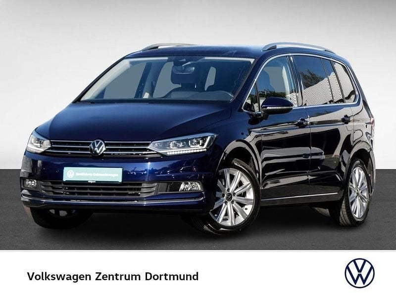Blau Gebraucht 2024 VW Touran Highline Van / Kleinbus | 35.036 € (Fairer Preis) - Bild 1/4