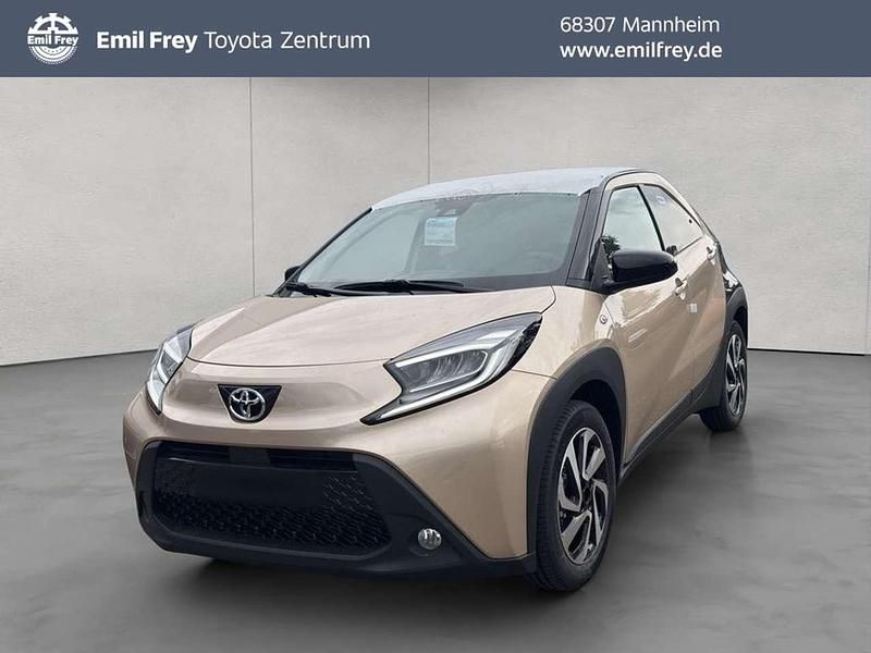 Ginger beige / night sky Neu 2025 Toyota Aygo Kleinwagen | 20.850 € - Bild 1/4