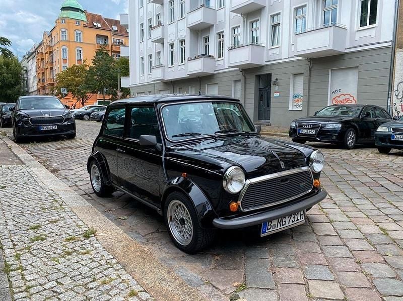Second-hand Mini 1000 41 CP (30 kW) 1990 Negru Hatchback