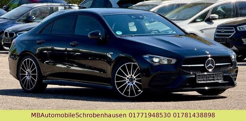 Kosmosschwarz metalliclack Gebraucht 2021 Mercedes CLA200 AMG Coupé | 29.999 € (Guter Preis) - Bild 1/4