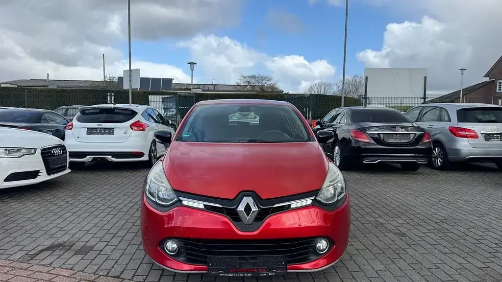 Używany Renault Clio IV Initiale Paris 90 KM (66 kW) 2014 Pomarańczowy Sedan/Limuzyna