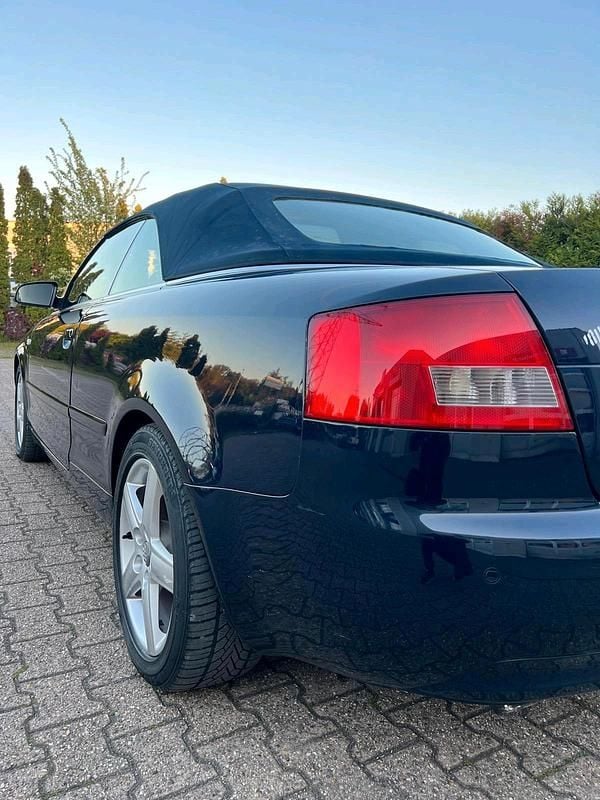 Second-hand Audi A4 163 CP (119 kW) 2004 Albastru Cabrio