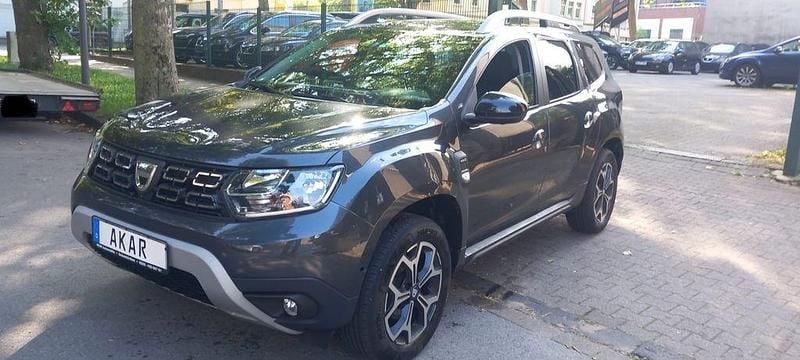 Grau Gebraucht 2021 Dacia Duster Celebration SUV | 14.500 € (Superpreis) - Bild 1/4