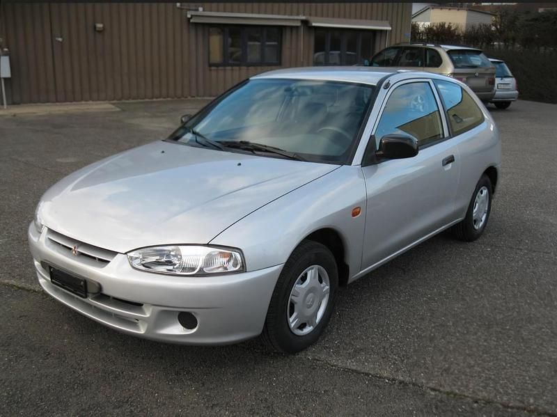 Gebraucht Mitsubishi Colt 75 PS (55 kW) 1996 Silber Kleinwagen