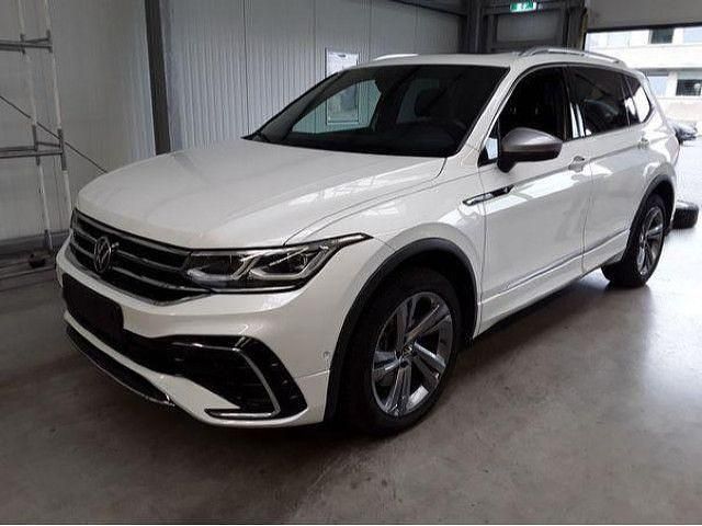 Oryxweiß perlmutteffekt Gebraucht 2024 VW Tiguan Allspace R-line SUV | 45.980 € (Fairer Preis) - Bild 1/4