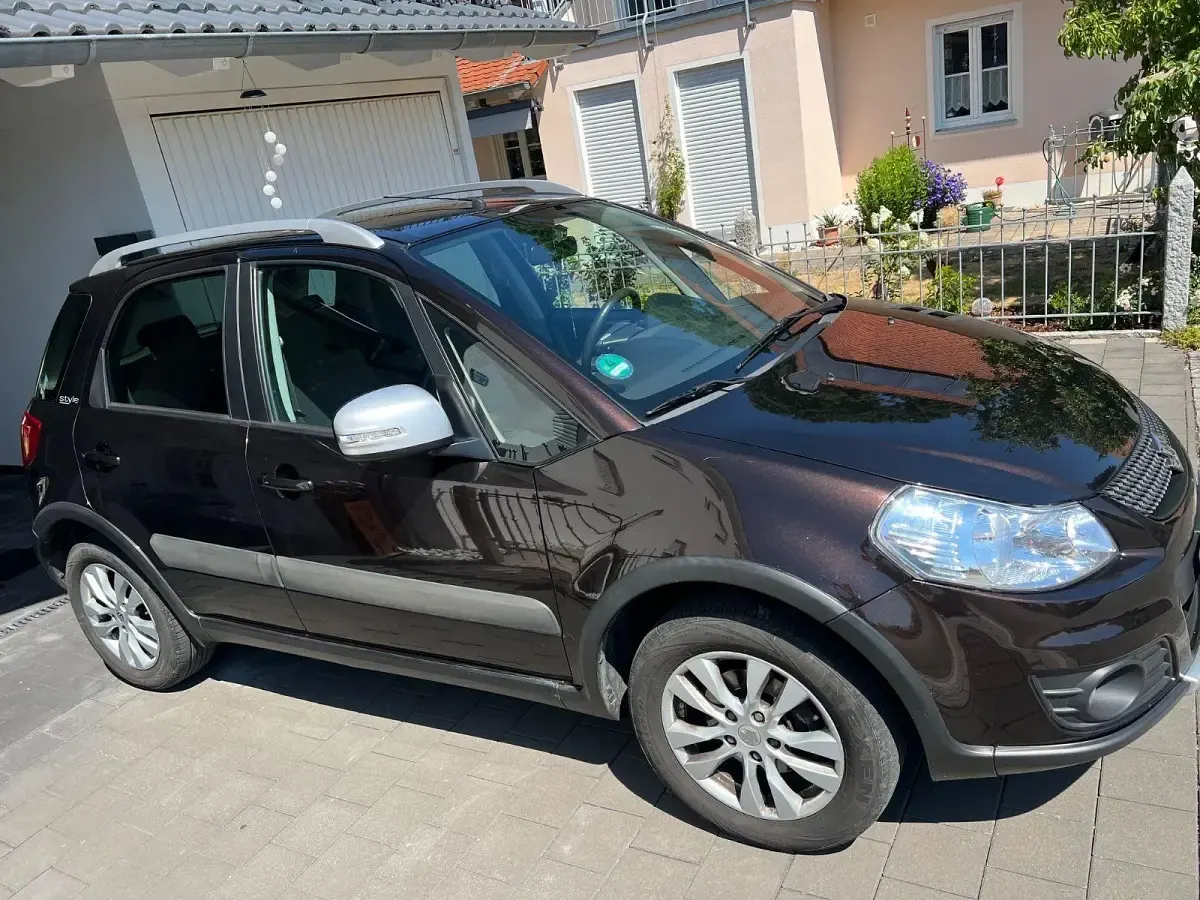 Gebraucht Suzuki SX4 Comfort 120 PS (88 kW) 2013 Braun Limousine