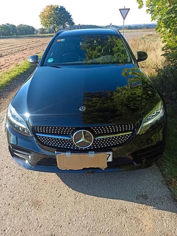 Schwarz Gebraucht 2020 Mercedes C180 AMG line Limousine | 25.799 € (Guter Preis) - Bild 1/4