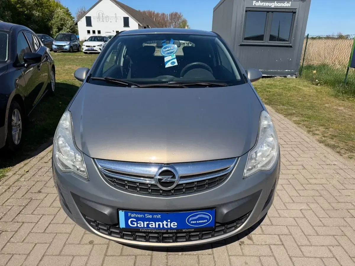 Gebraucht Opel Corsa Active 69 PS (50 kW) 2013 Braun Kleinwagen