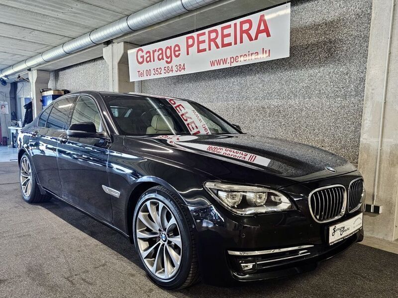 Schwarz Gebraucht 2015 BMW 750 Limousine | 38.900 € (Teuer) - Bild 1/4